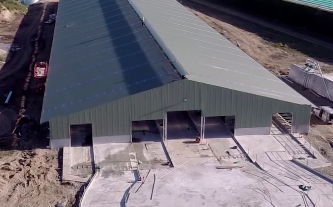 Aerial view of a dairy barn on a New Zealand dairy farm