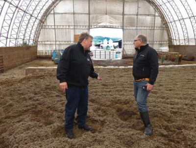 brad cowan discussing principles manure management with kelvin